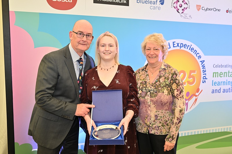 Ellie celebrating her Individual Progress Award with her parents. The award was presented on stage by Head Judges Esther Onyeka and Rebecca Gray, and Michael Vose from My Purchasing Partner, the award sponsor. 